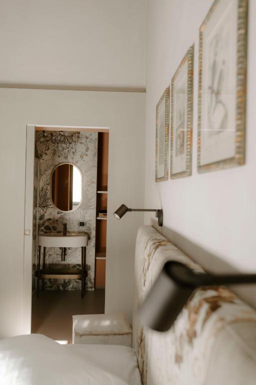 Postel nebo postele na pokoji v ubytování ALMA bed & breakfast