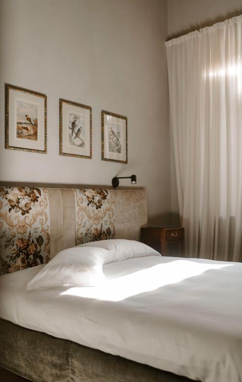 Postel nebo postele na pokoji v ubytování ALMA bed & breakfast