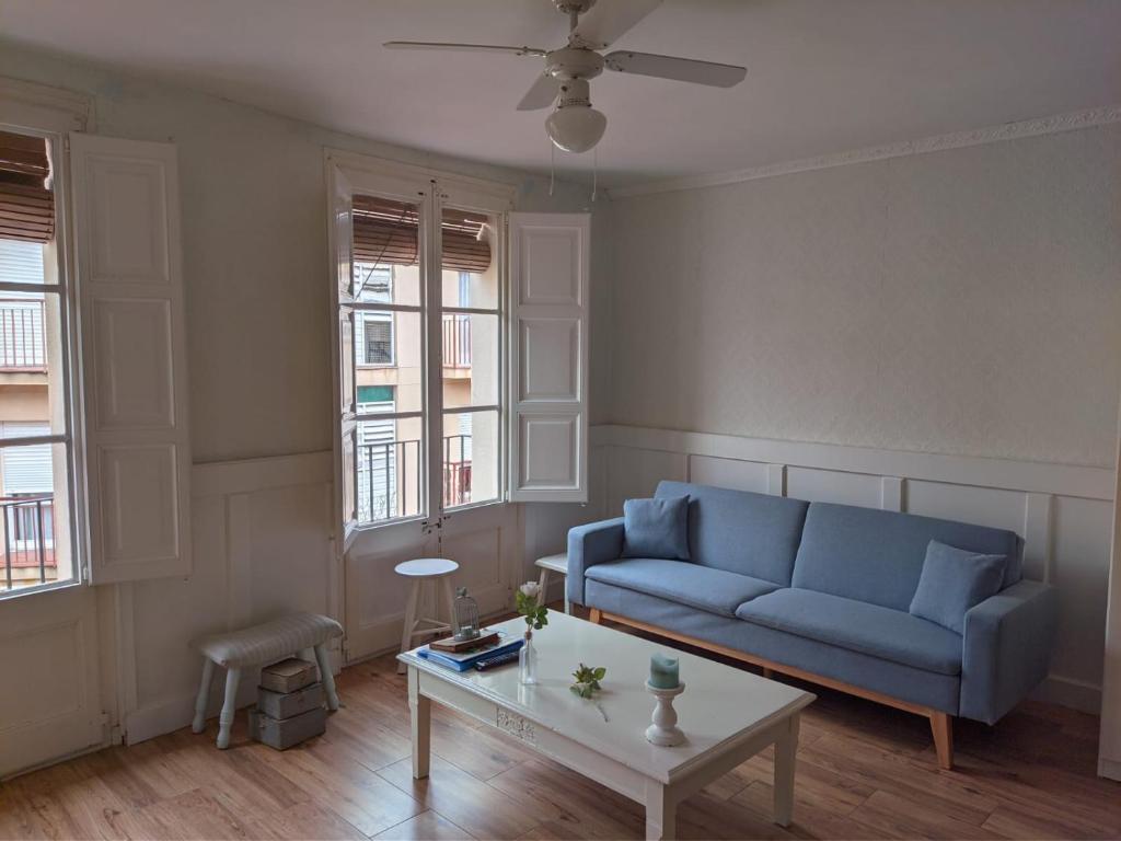 A seating area at Reus, cosy apartment in the city's centre