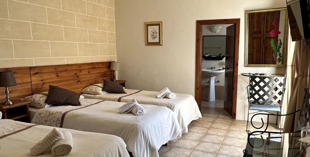 Postel nebo postele na pokoji v ubytování Green Grove Guest House
