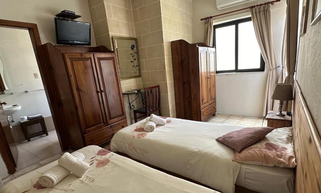 Postel nebo postele na pokoji v ubytování Green Grove Guest House