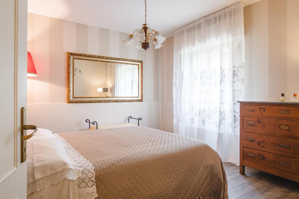 Postel nebo postele na pokoji v ubytování Il Cerretello - Tuscan Experience