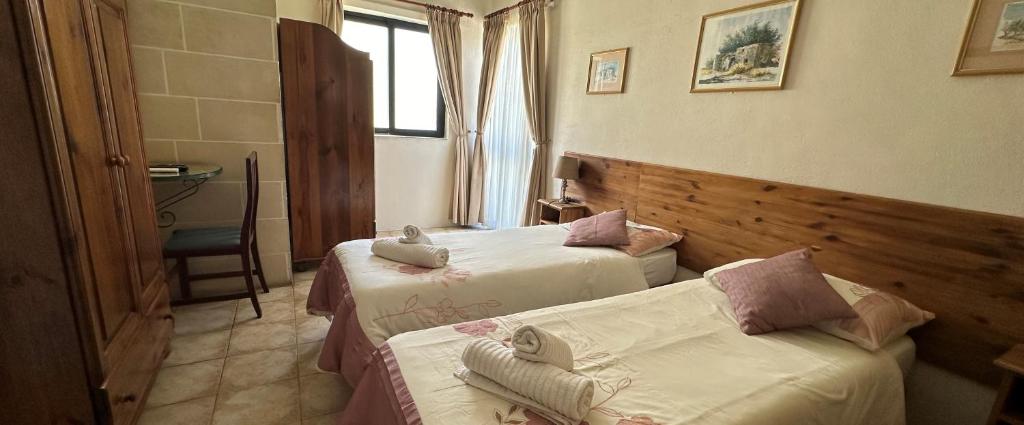 Postel nebo postele na pokoji v ubytování Green Grove Guest House