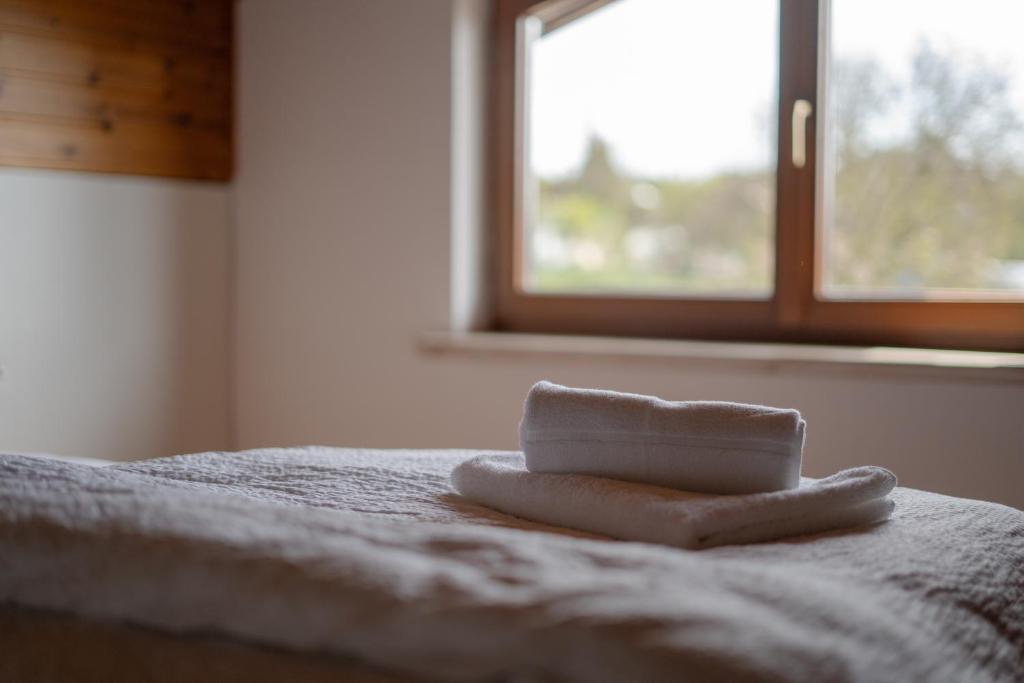 Posteľ alebo postele v izbe v ubytovaní S.A.W. Rooms