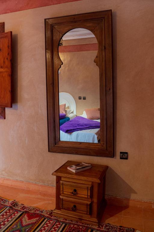 Postel nebo postele na pokoji v ubytování Riad Tourtit