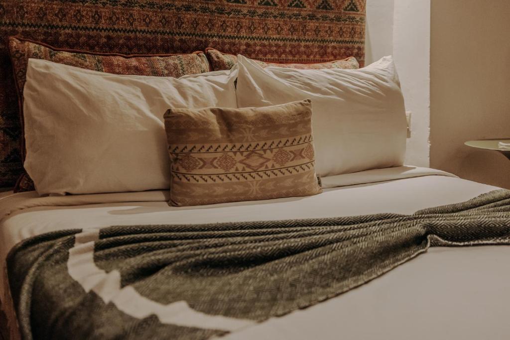 Postel nebo postele na pokoji v ubytování Riad Bab Ahmar