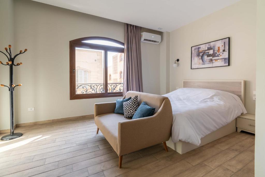 Postel nebo postele na pokoji v ubytování Sleep Inn Apart-Hotel