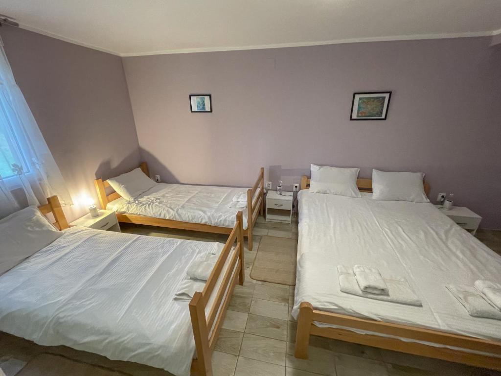 Postel nebo postele na pokoji v ubytování Apartmani Vera