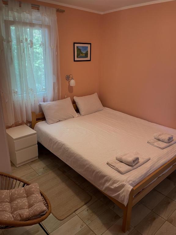 Postel nebo postele na pokoji v ubytování Apartmani Vera