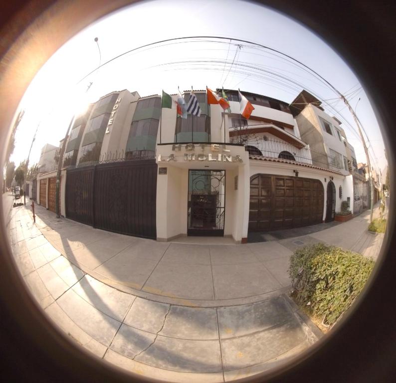 a circular view of a building with a round window at Hotel La Molina in Lima