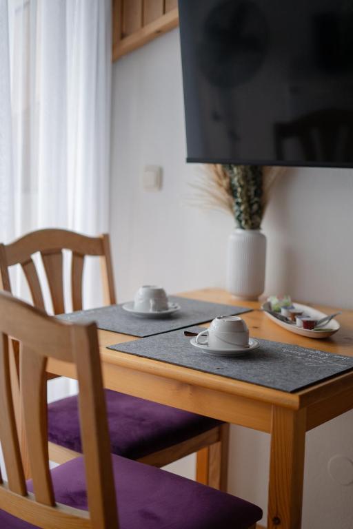 Televízia a/alebo spoločenská miestnosť v ubytovaní S.A.W. Rooms