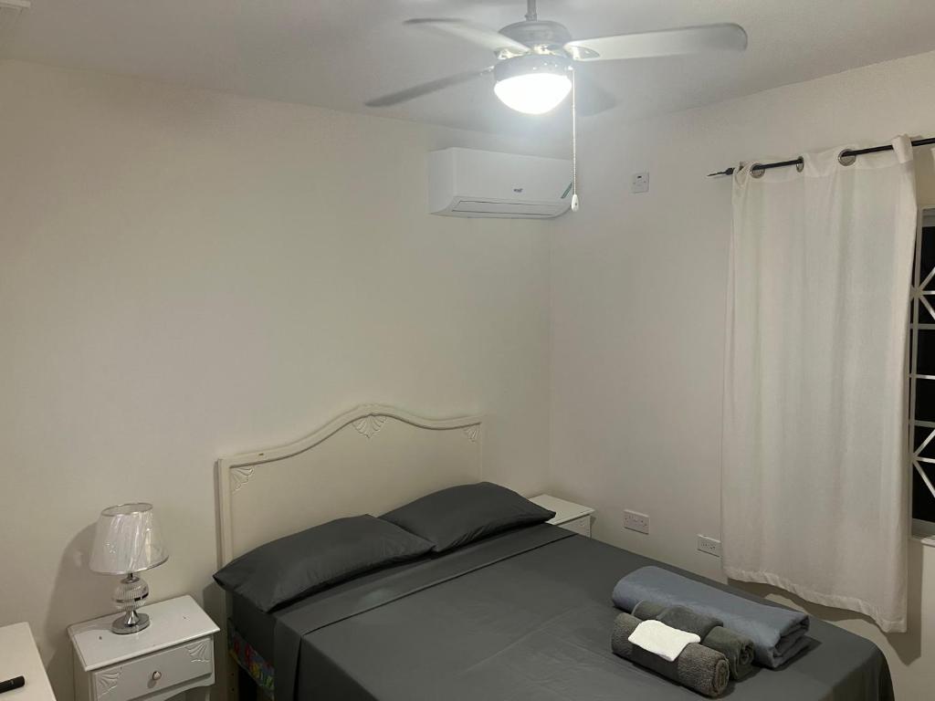 Postel nebo postele na pokoji v ubytování Mandeville ingleside luxury