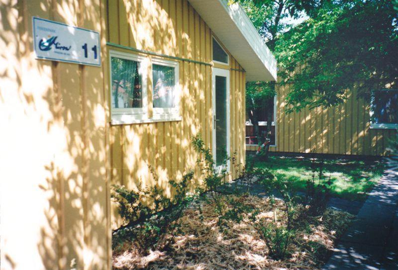 a house with a sign on the side of it at Seeschwalbe 11 in Mirow