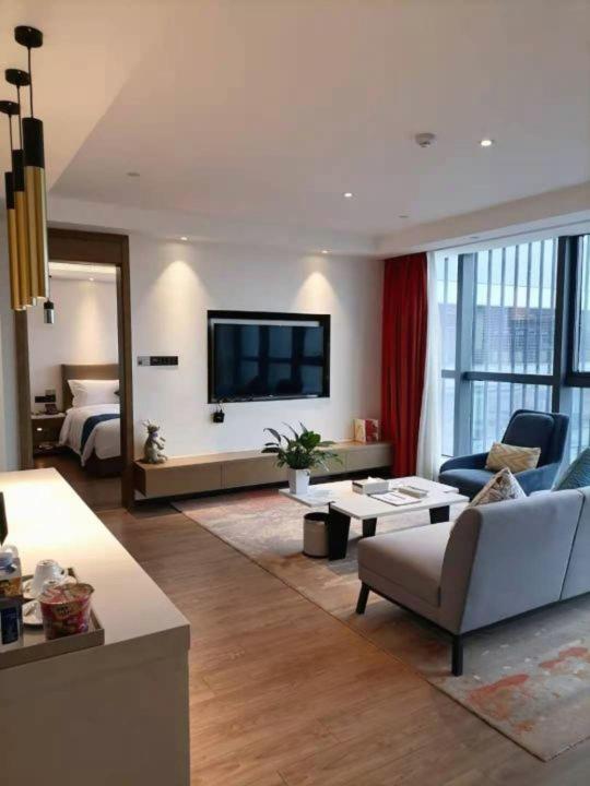 TV a/nebo společenská místnost v ubytování Changsha Zealandia Serviced Apartment