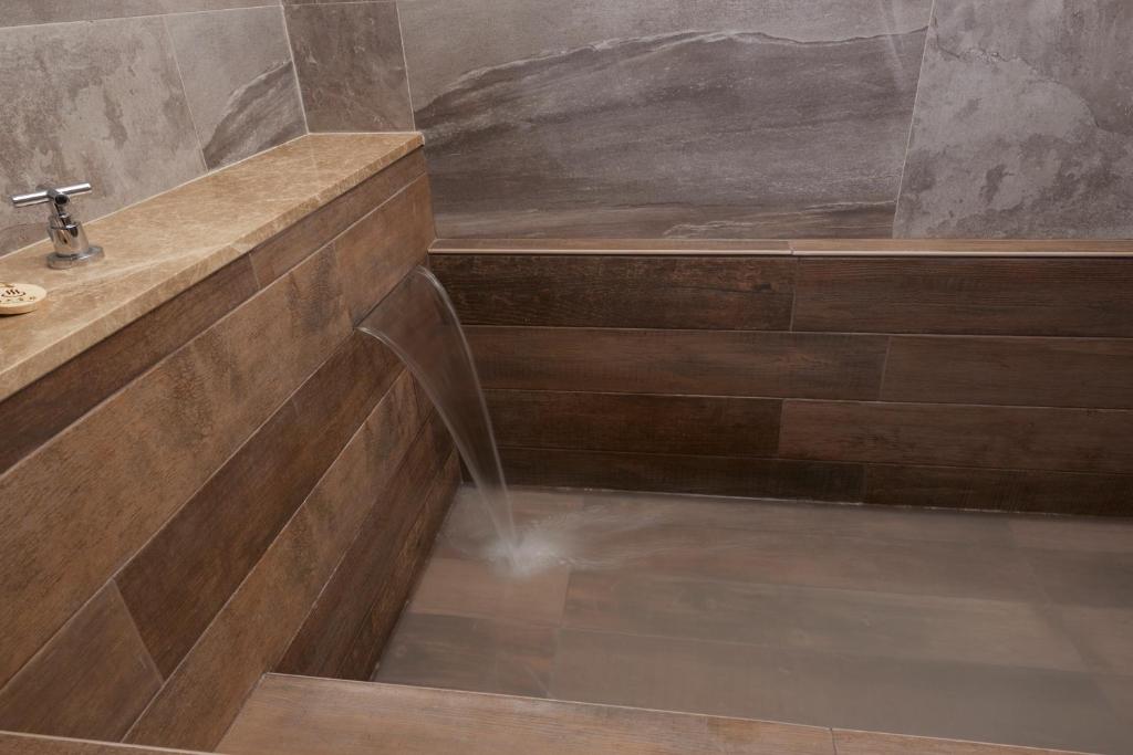Koupelna v ubytování Kyokusui Hotspring Hotel