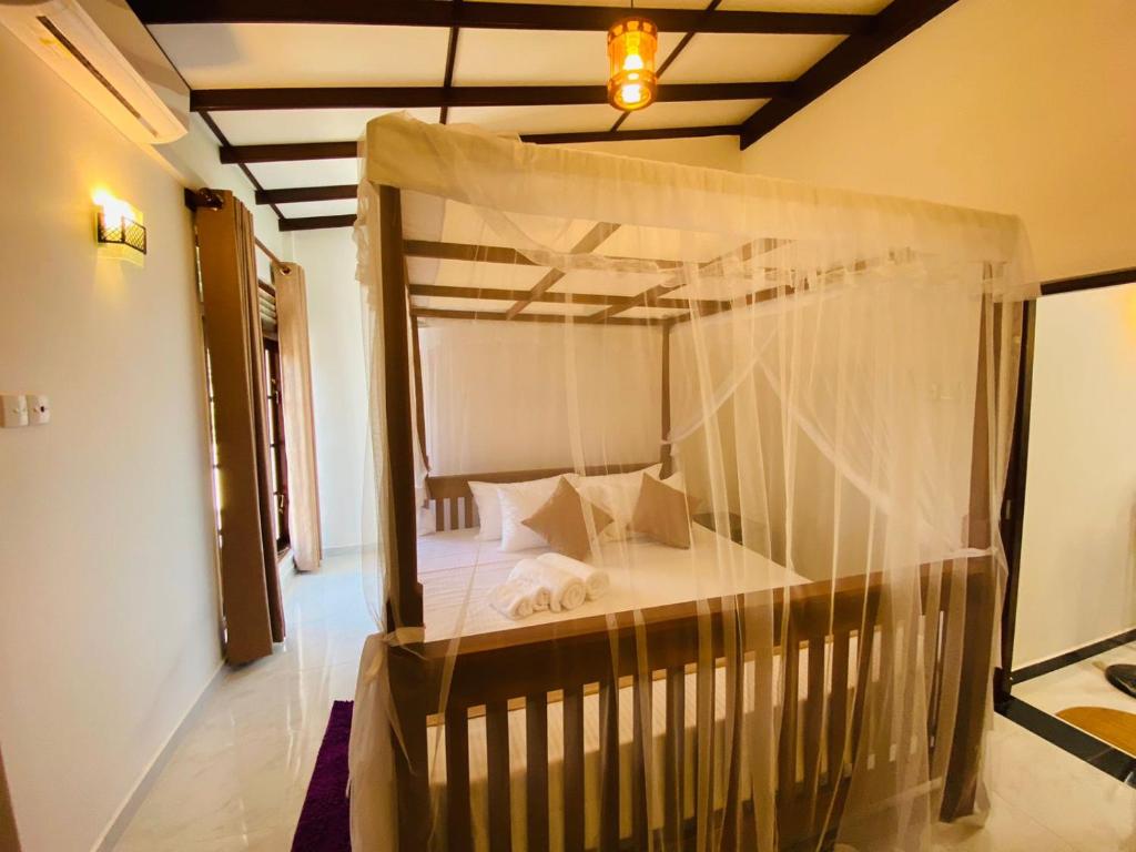 Postel nebo postele na pokoji v ubytování Tango Sunrise Villa
