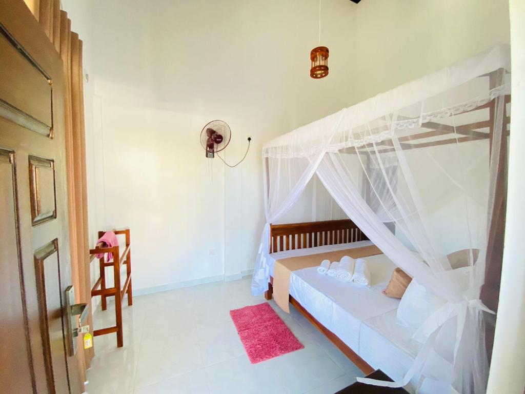 Postel nebo postele na pokoji v ubytování Tango Sunrise Villa