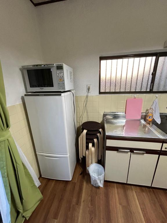 Kuchyň nebo kuchyňský kout v ubytování 高島市一棟貸切貸別荘グループファミリーok大人数でご利用だとお得連泊がお得