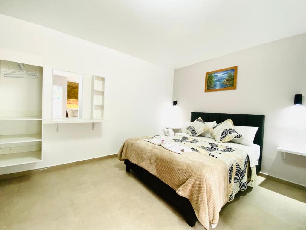 Postel nebo postele na pokoji v ubytování Casa Gaviota Dorada