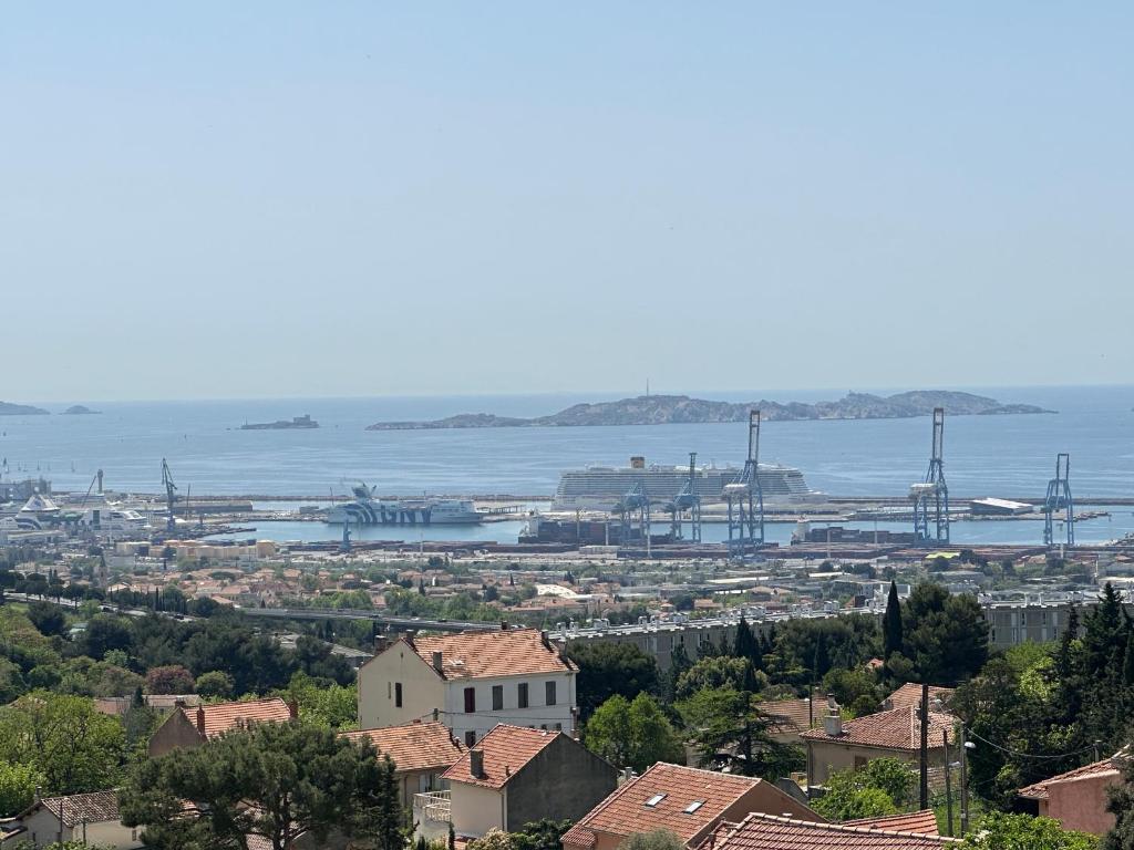 a view of a city and a harbor at FLC-Sea View-Jacuzzi-3 Bedrooms-8p-Parking for 2 cars in Marseille