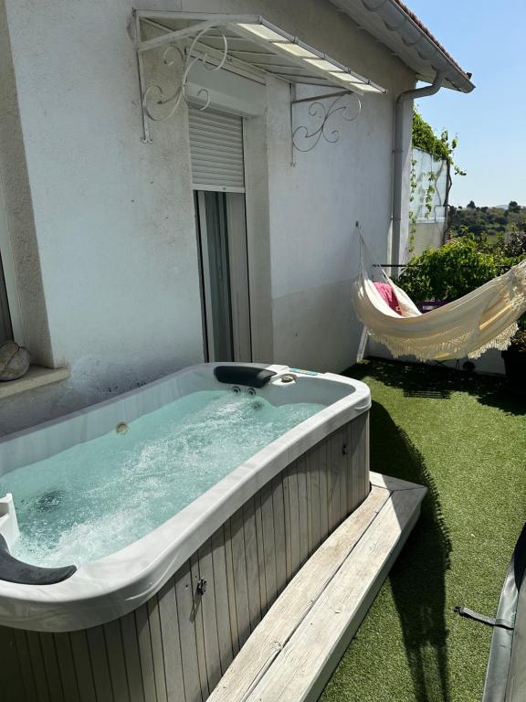 a hot tub in the backyard of a house at FLC-Sea View-Jacuzzi-3 Bedrooms-8p-Parking for 2 cars in Marseille