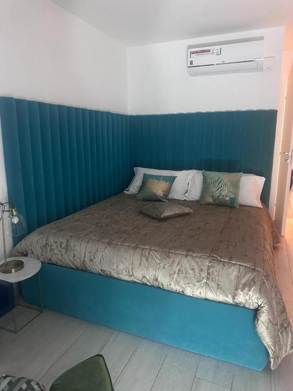 Postel nebo postele na pokoji v ubytování Altamarea Rooms