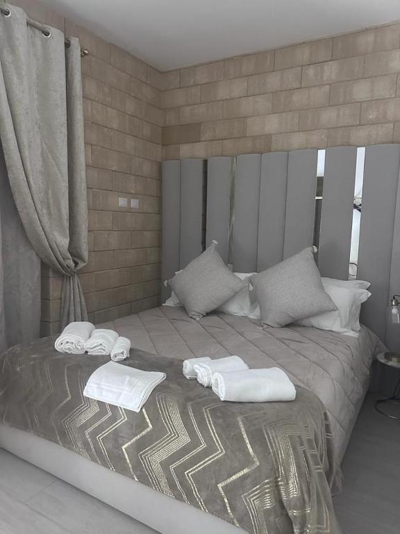Postel nebo postele na pokoji v ubytování Altamarea Rooms