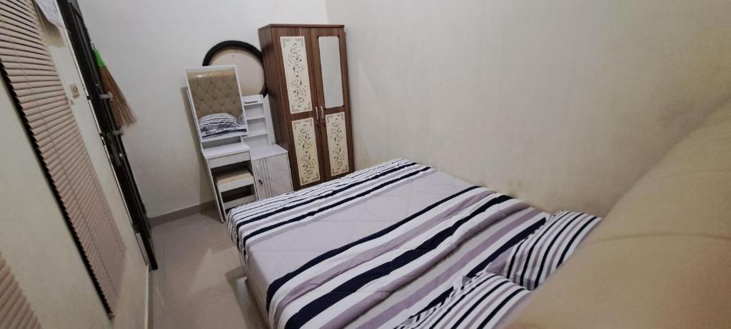 Postel nebo postele na pokoji v ubytování Vallery homestay
