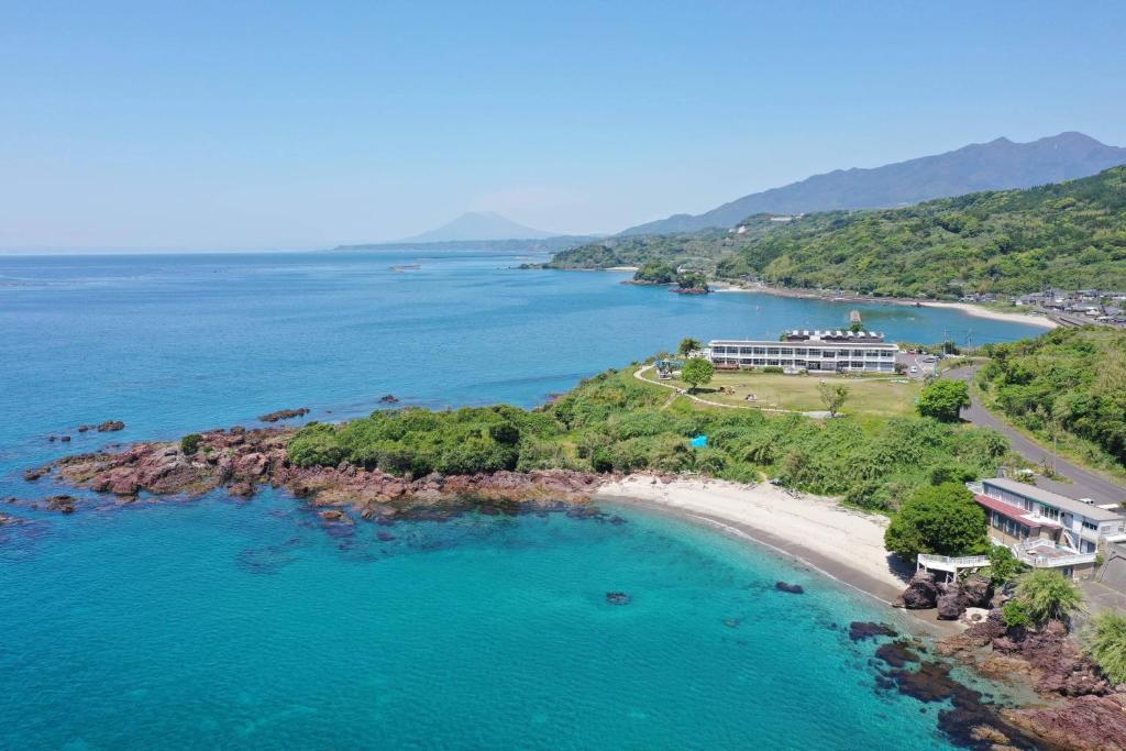 an aerial view of a beach with a resort at YUKUSA OHSUMI UMI no GAKKO in Kanoya