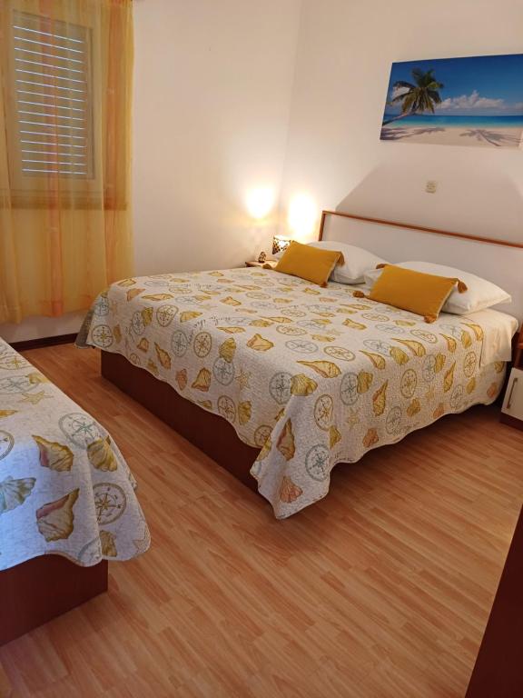 Posteľ alebo postele v izbe v ubytovaní Apartments Jure Miljak