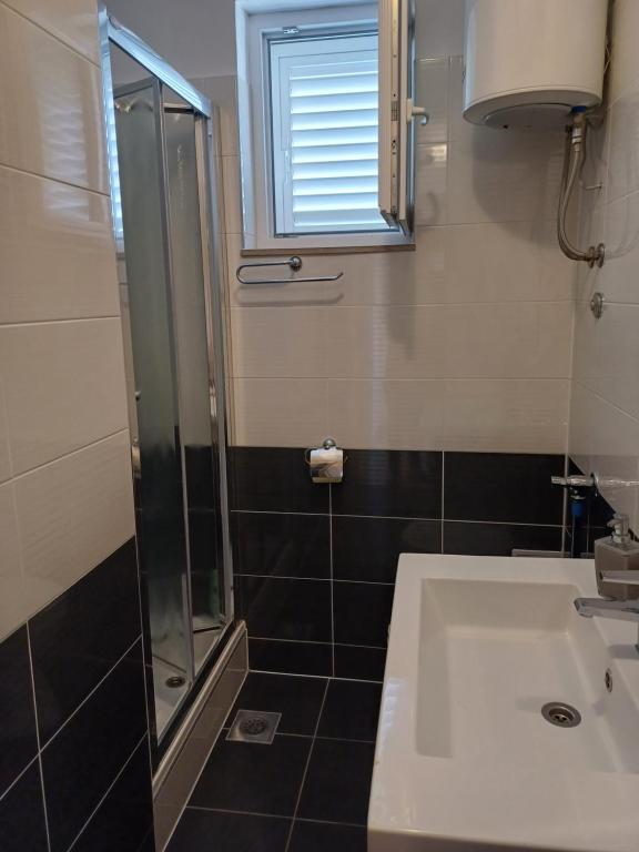 Kúpeľňa v ubytovaní Apartments Jure Miljak