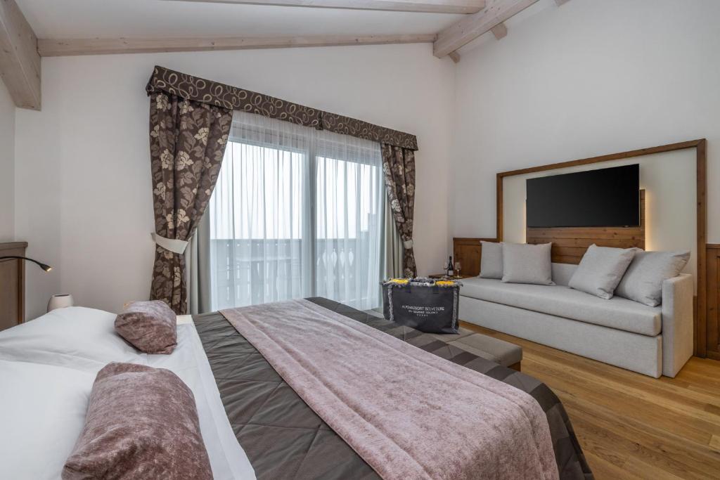 Postel nebo postele na pokoji v ubytování Alpenresort Belvedere