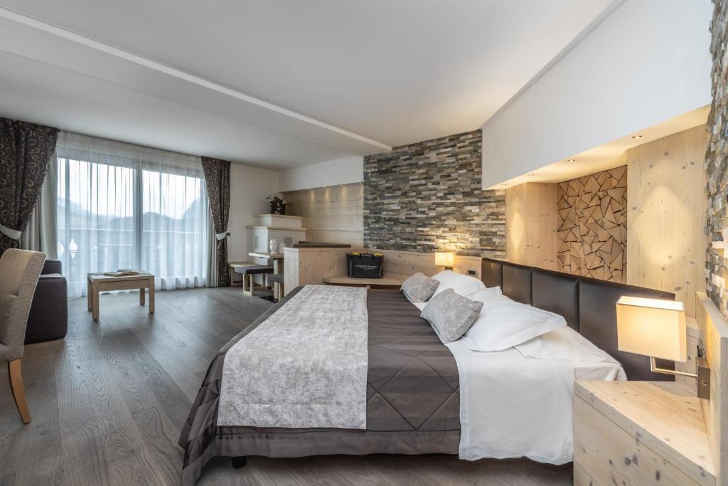 Postel nebo postele na pokoji v ubytování Alpenresort Belvedere