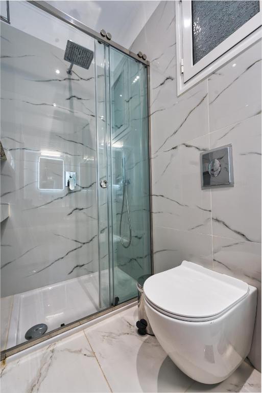 Kúpeľňa v ubytovaní Dennis City Center Elegant Apartment (2)