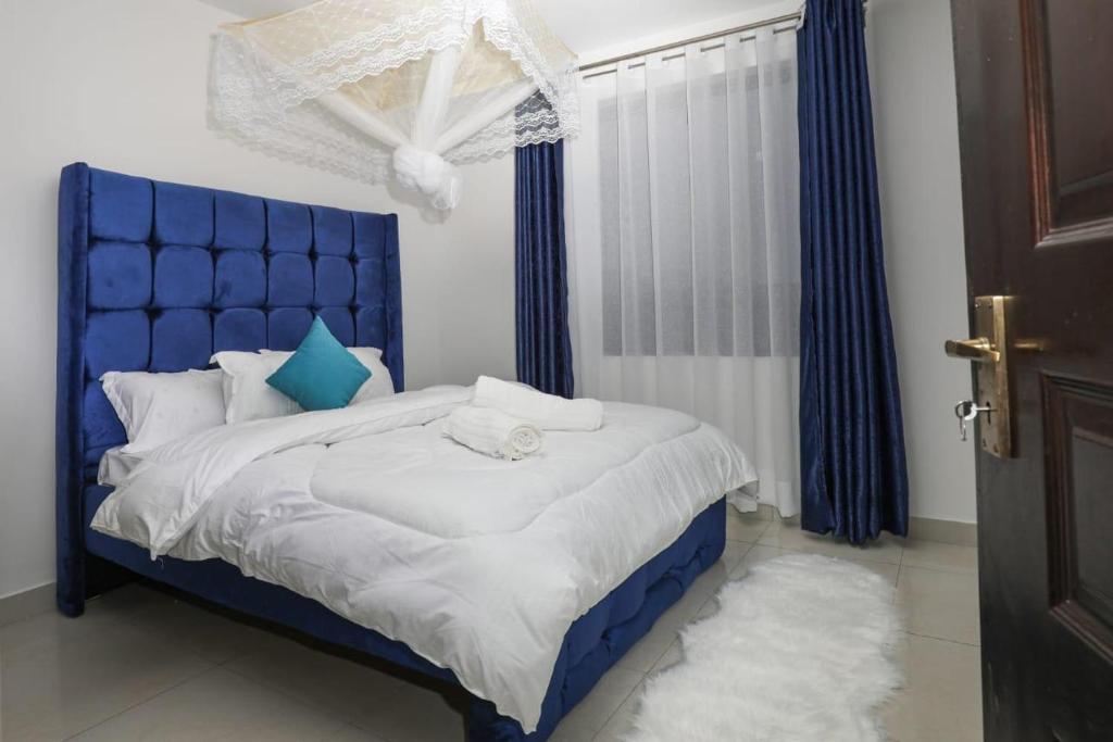 Ένα ή περισσότερα κρεβάτια σε δωμάτιο στο Amalia BNB Apartment