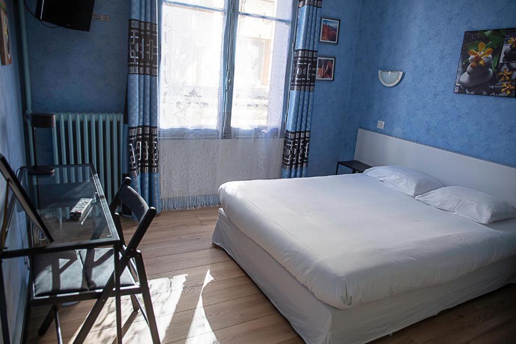 Postel nebo postele na pokoji v ubytování Trianon