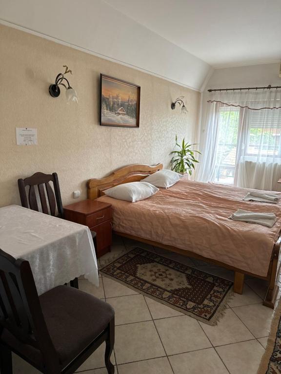 Postel nebo postele na pokoji v ubytování ЕЛІТ