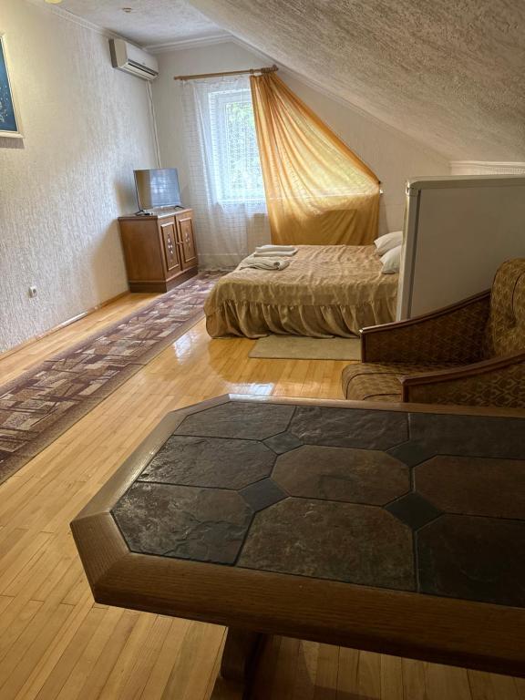 Postel nebo postele na pokoji v ubytování ЕЛІТ
