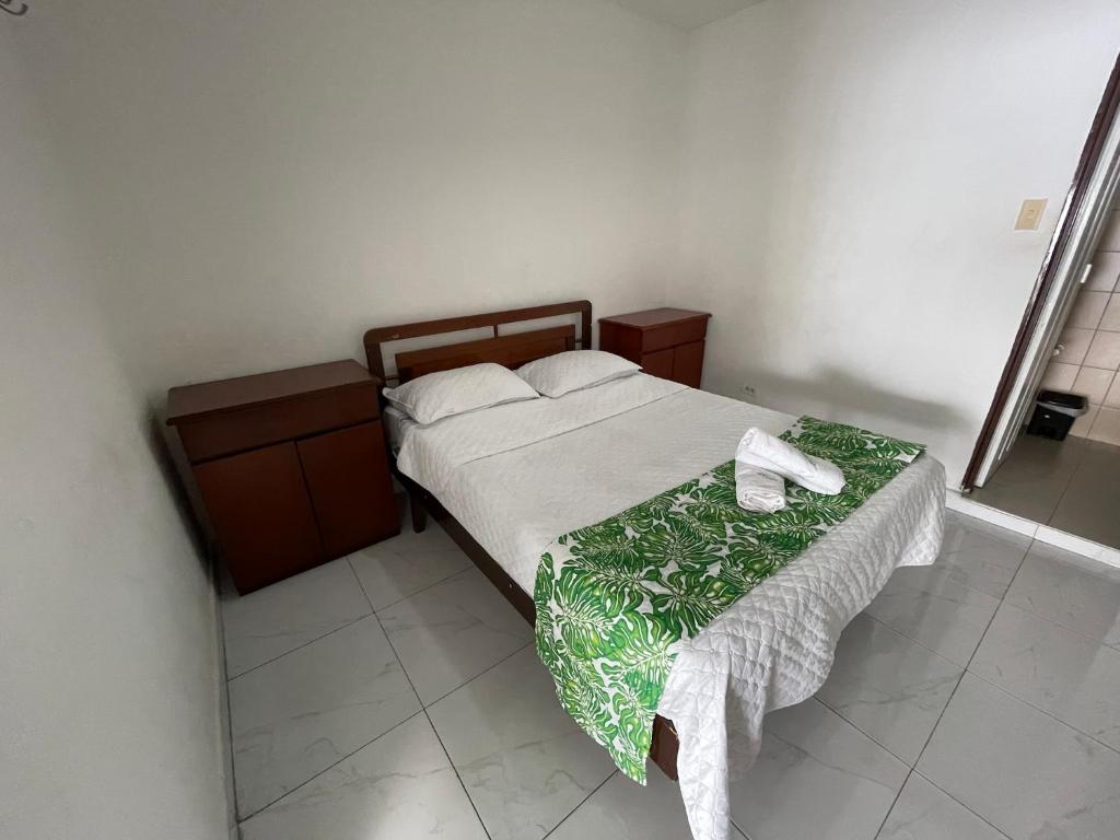 Postel nebo postele na pokoji v ubytování Hotel Maratea Melgar