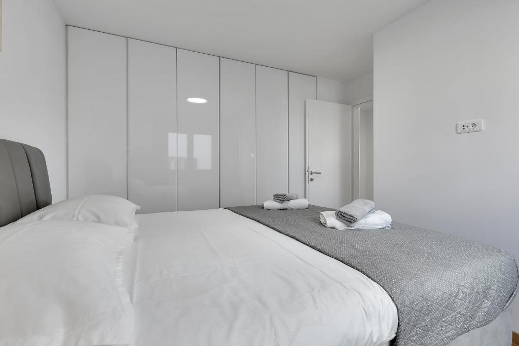 Posteľ alebo postele v izbe v ubytovaní Apartment Sky Makarska