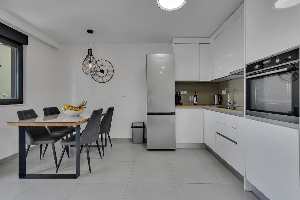 Kuchyňa alebo kuchynka v ubytovaní Apartment Sky Makarska