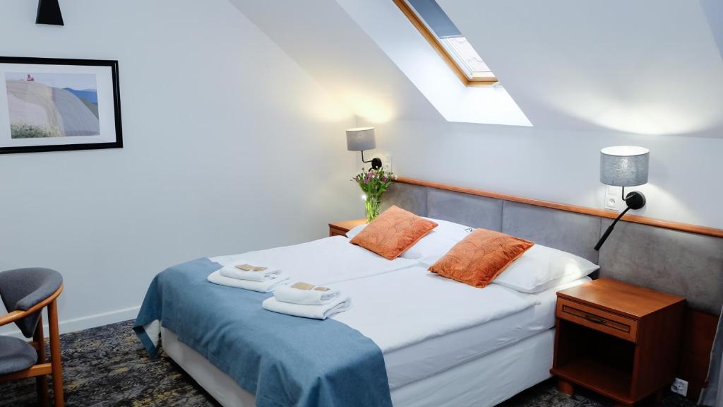 Postel nebo postele na pokoji v ubytování Hotel Rezydencja AS & Spa-Najwyżej w Karpaczu