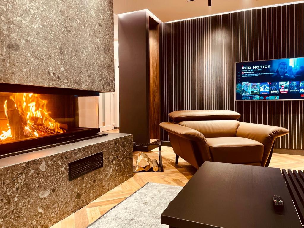 TV a/nebo společenská místnost v ubytování Vera HOTEL-VILLA