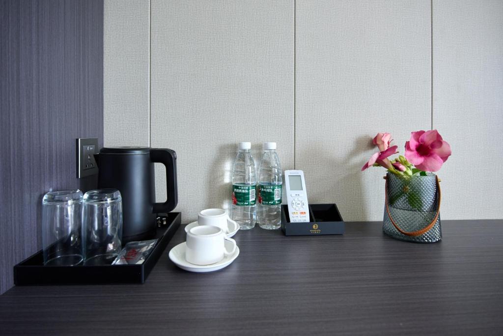 Belmond Hotel 贝尔曼酒店にあるコーヒーまたはお茶