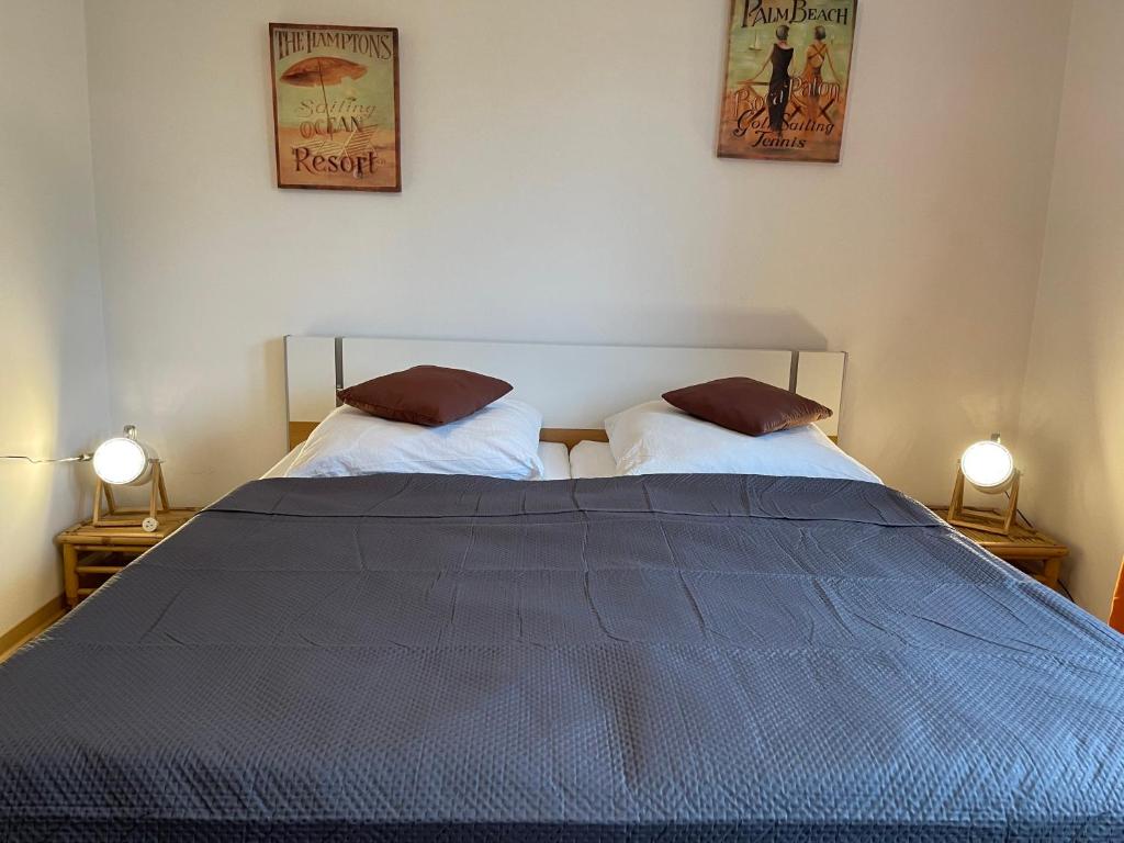 Postel nebo postele na pokoji v ubytování M&M Serviced Appartment