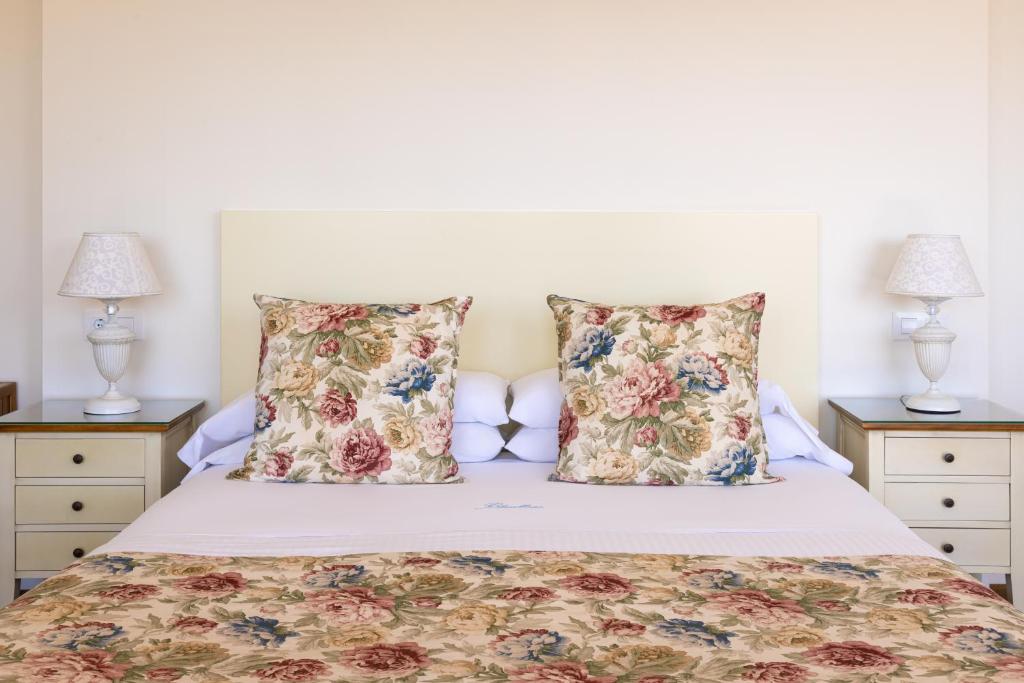 Hotel BlauMar Llafrancにあるベッド