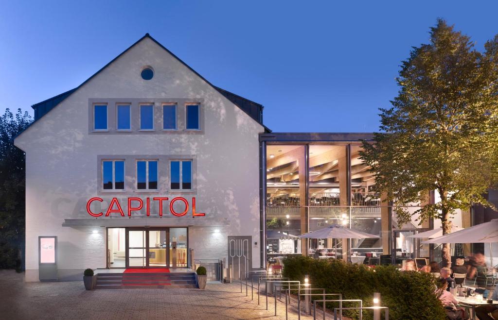 a building with a sign that reads car portal at Das Neue CAPITOL in Bad Berleburg