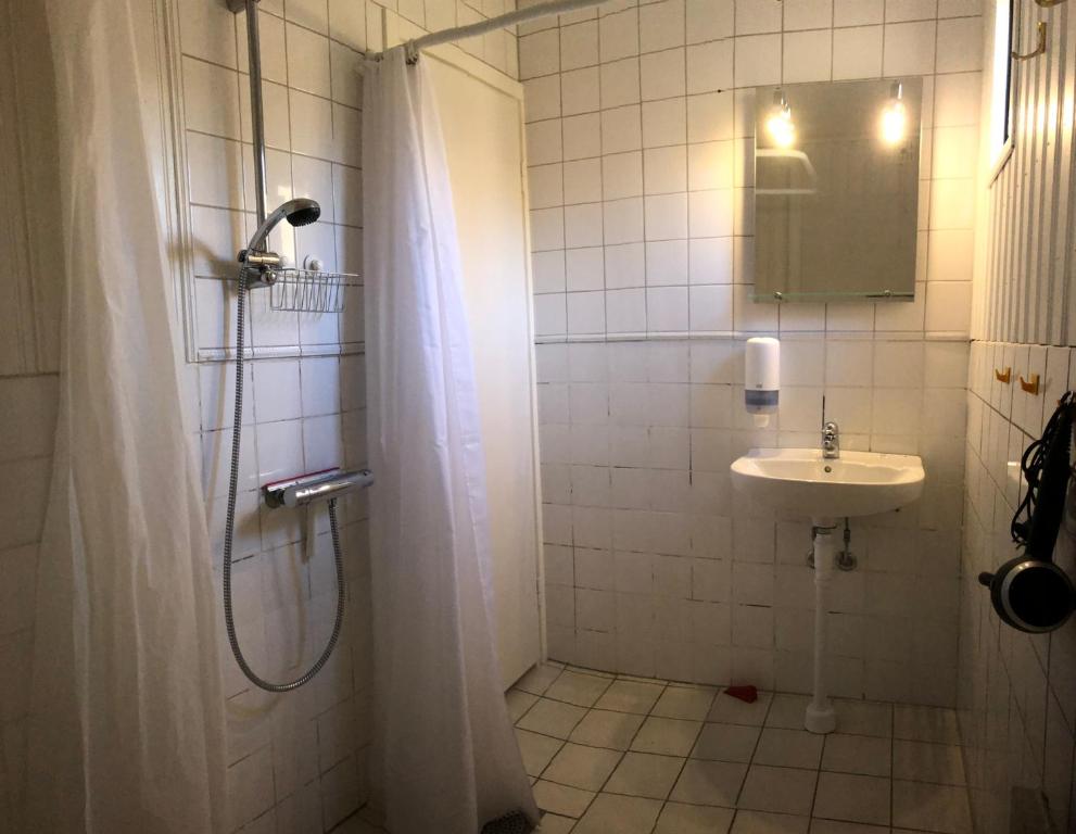 Koupelna v ubytování Eriksmåla Art Residence