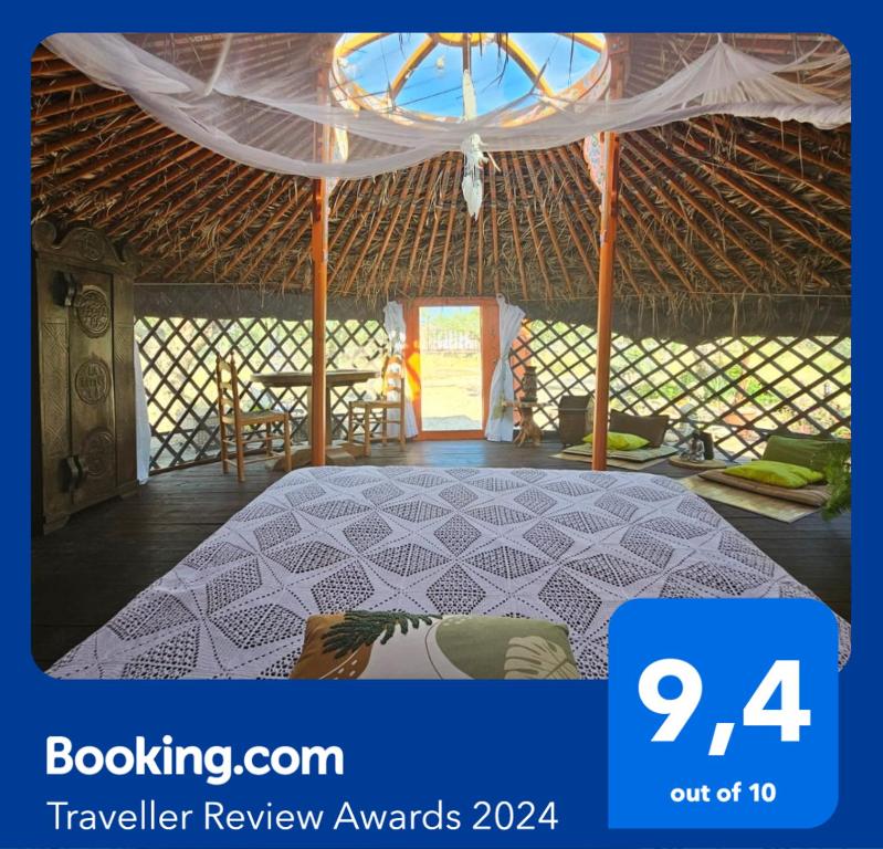 Postel nebo postele na pokoji v ubytování Yurta Bora Bora