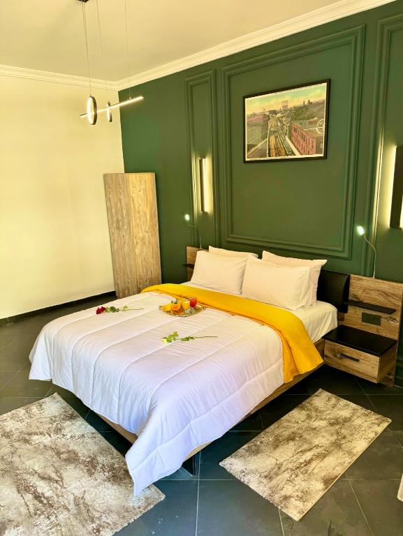Postel nebo postele na pokoji v ubytování The Hotel Syracuse